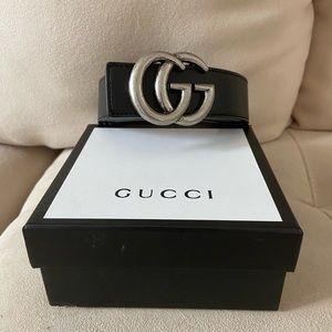 Silver on black Gucci belt
